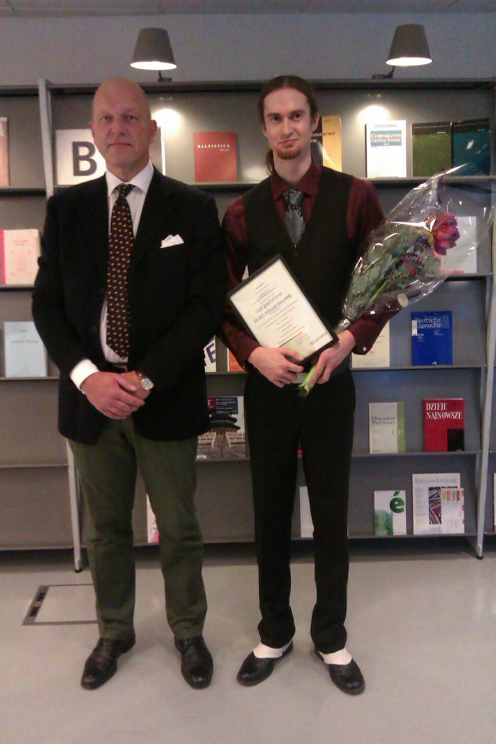 Bild 2. Prisutdelningen. Christoffer Jarnvall och Per Magnus Haaland.